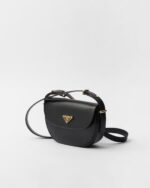 Prada Arqué flip leather shoulder bag