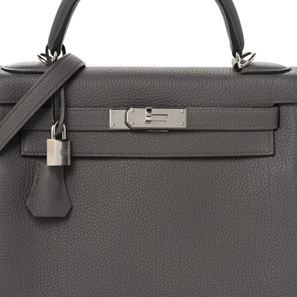 Togo Kelly Retourne 28 Etain