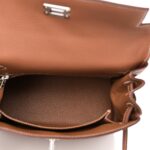 Togo Kelly Retourne 25 Gold